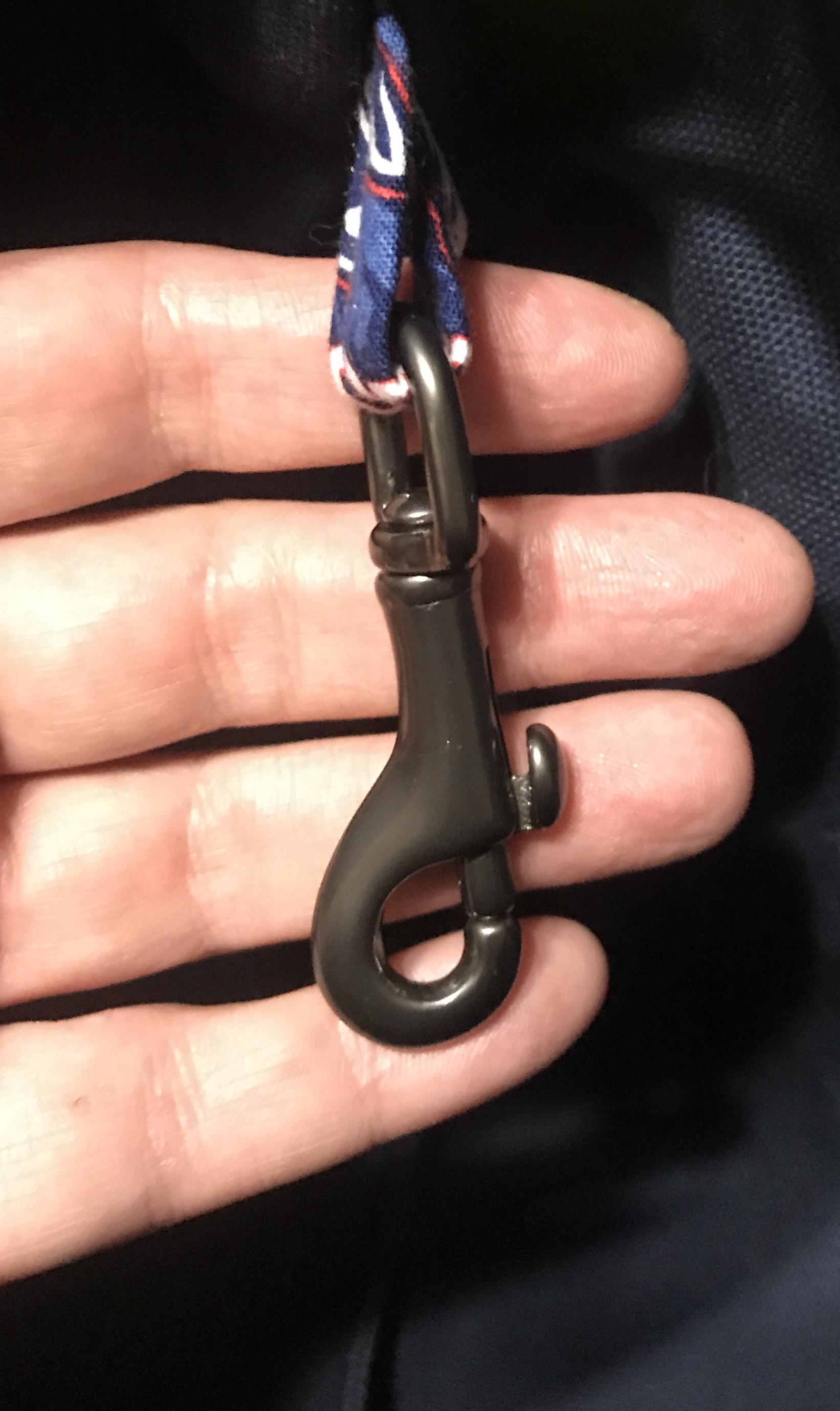Swivel hook inside for keys, etc. (color of hook may vary)