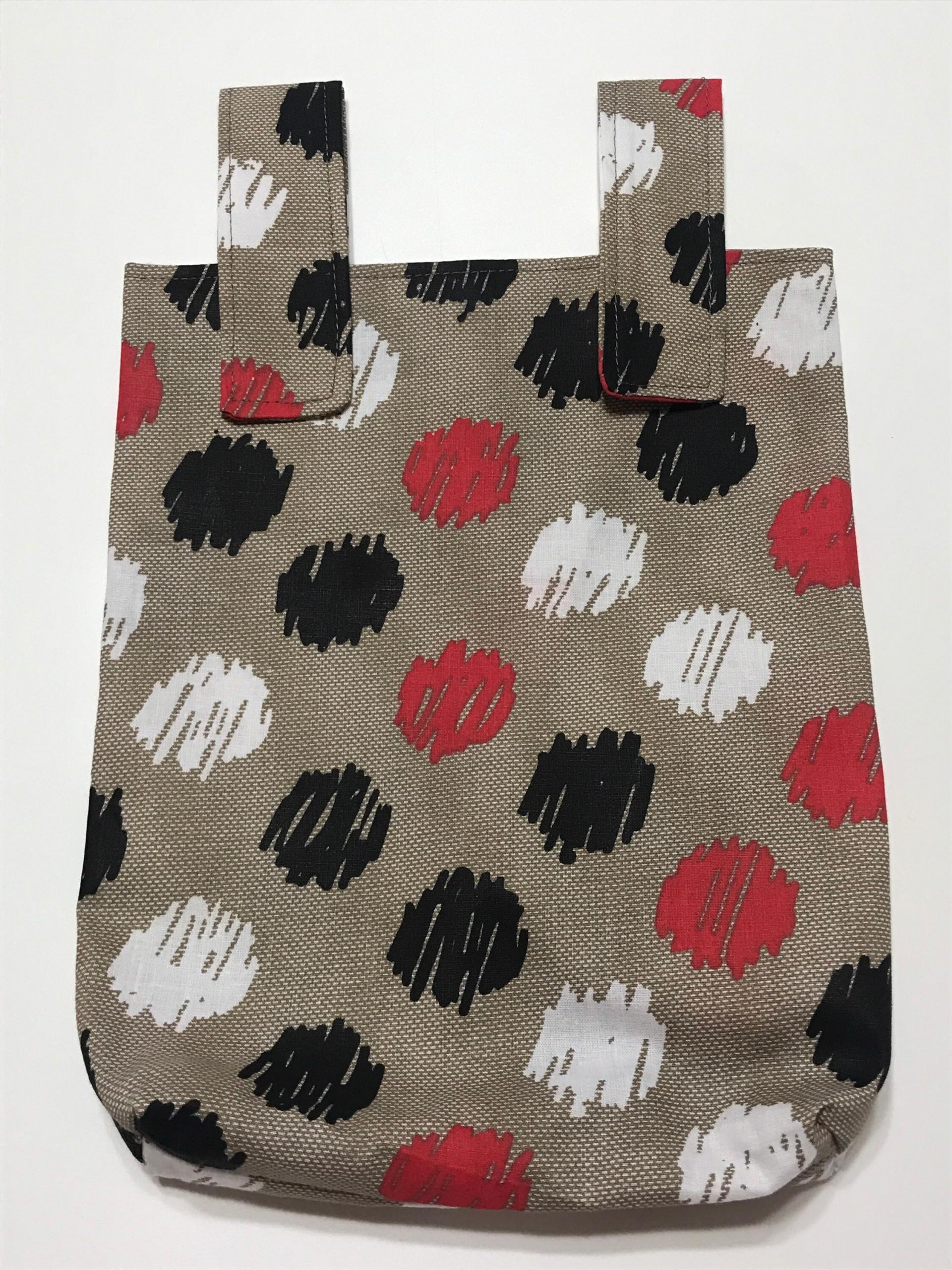 Simple small basic crutch bag, walker bag, scooter handlebars bag, bed rail caddy, hanging bag, large polka dots on tan background