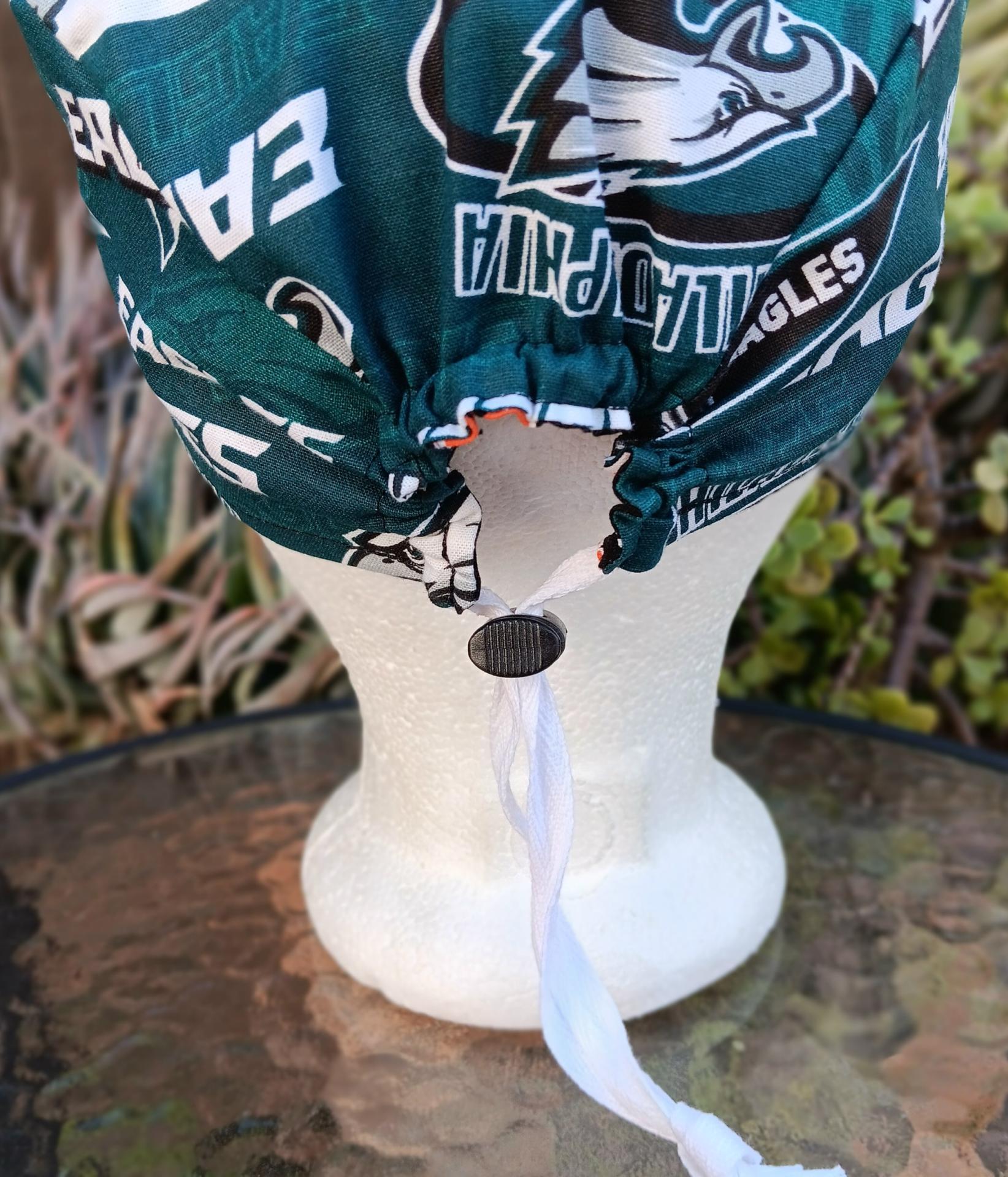Back view of the Philadelphia Phillies and Eagles reversible scrub cap, showing the adjustable toggle closure. Handmade from licensed fabrics.