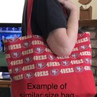 Example of similar bag to show size while carrying over shoulder