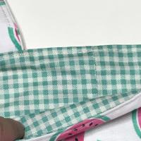 Lining is green gingham check