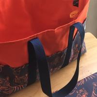 Included detachable zipper pouch and fob