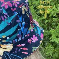 Example of hat with different fabric, worn by adult woman