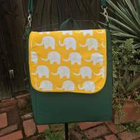 Slim tall messenger style cross body scorebook bag or satchel, canvas, vinyl bottom, white elephants on yellow