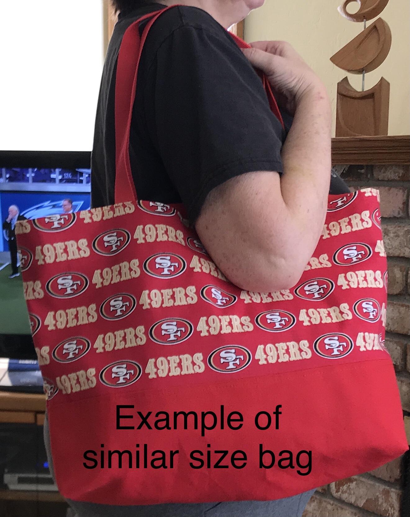 Example of similar bag to show size while carrying over shoulder