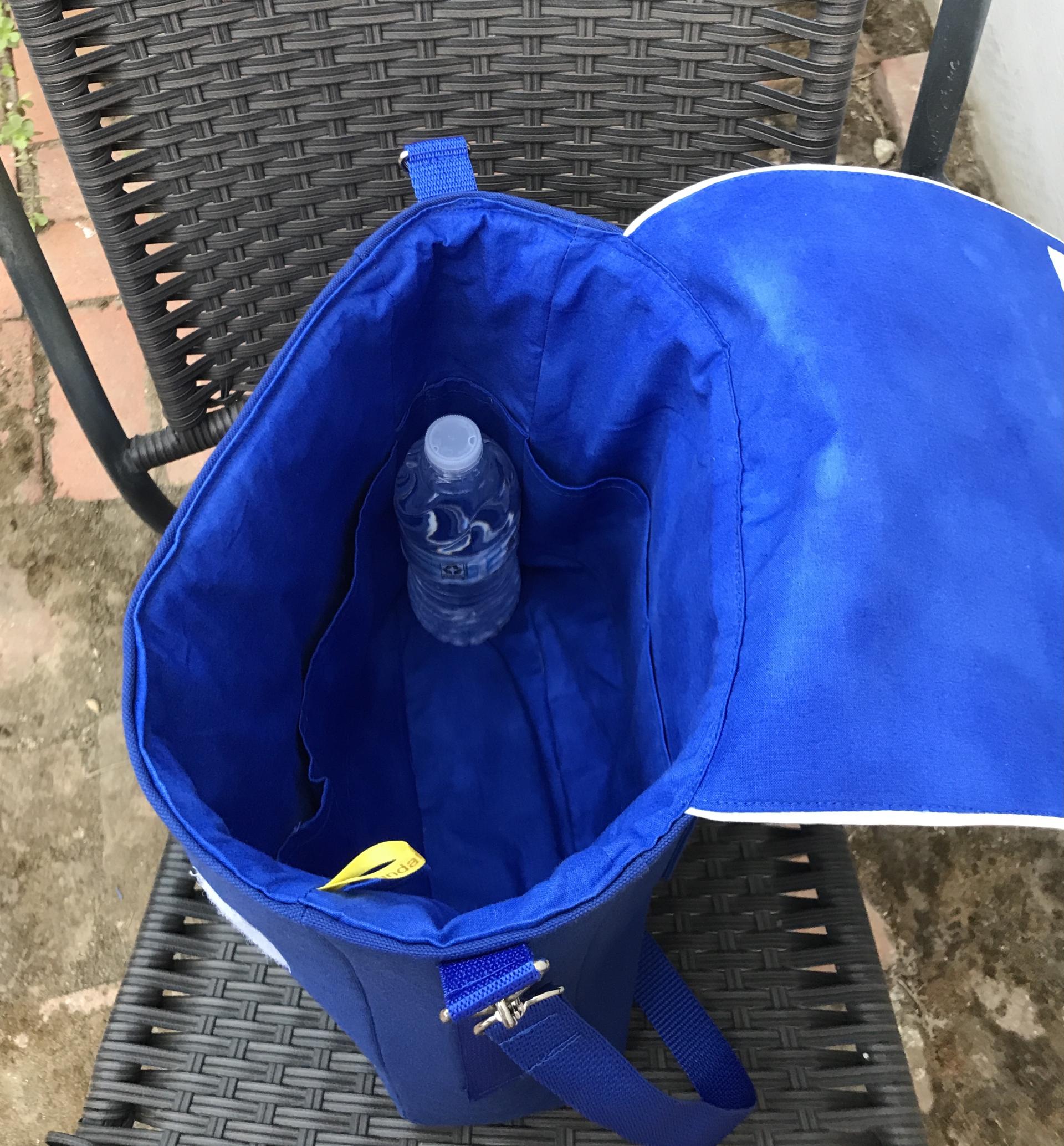 Water bottle (not included) to show size of bag