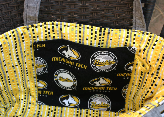 Close up to show lining with one slip pocket
