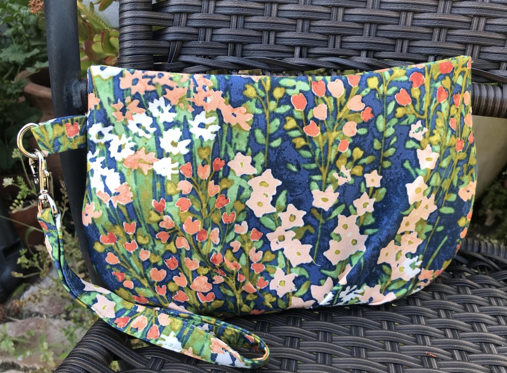 Pleated floral wristlet clutch purse, recessed zipper top, removable swivel wrist strap, cosmetic bag, make up pouch, bridesmaid gift, garden wedding, blue green peach orange flowers