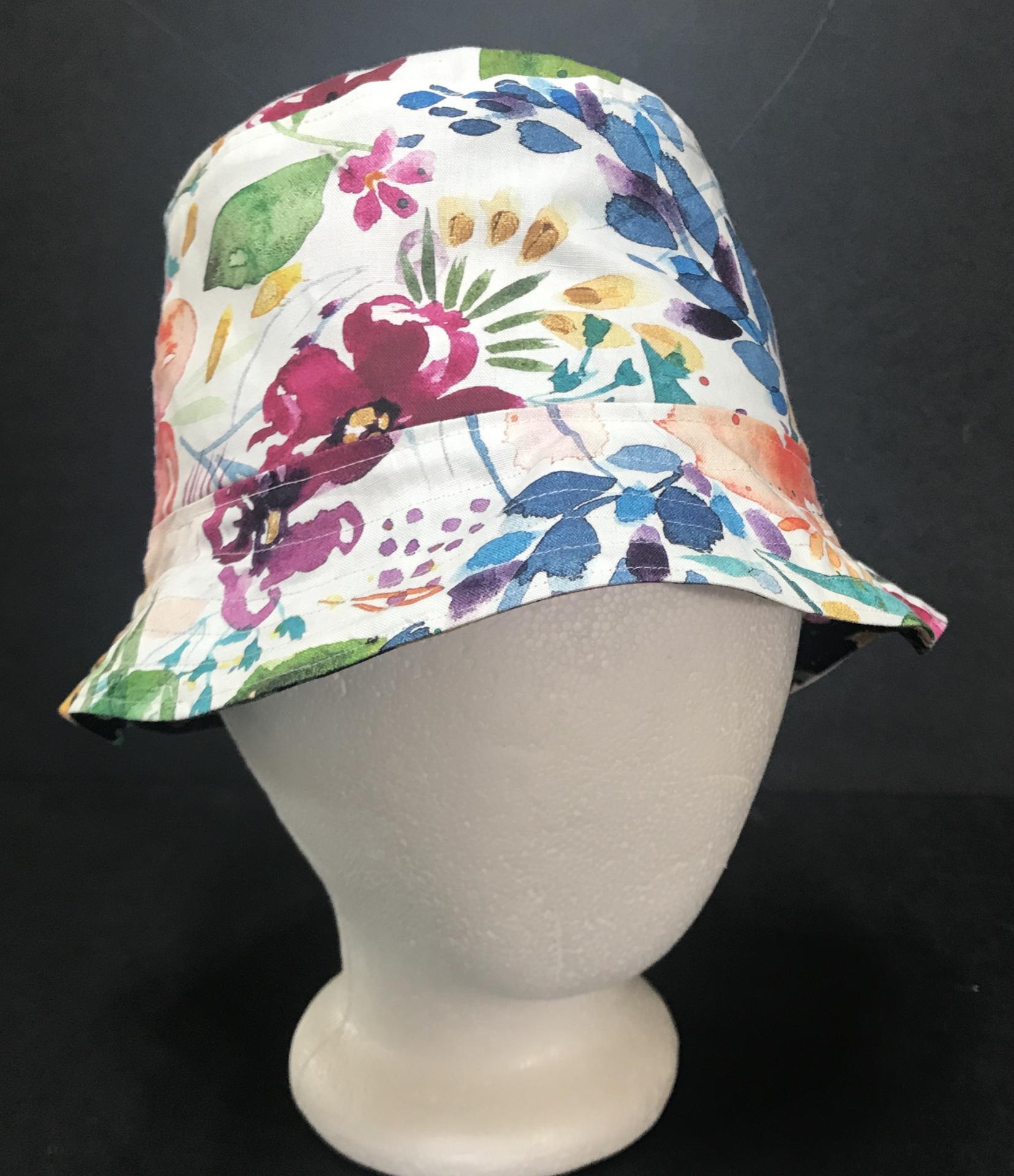 Watercolor floral print bucket hat, white backgound side facing out