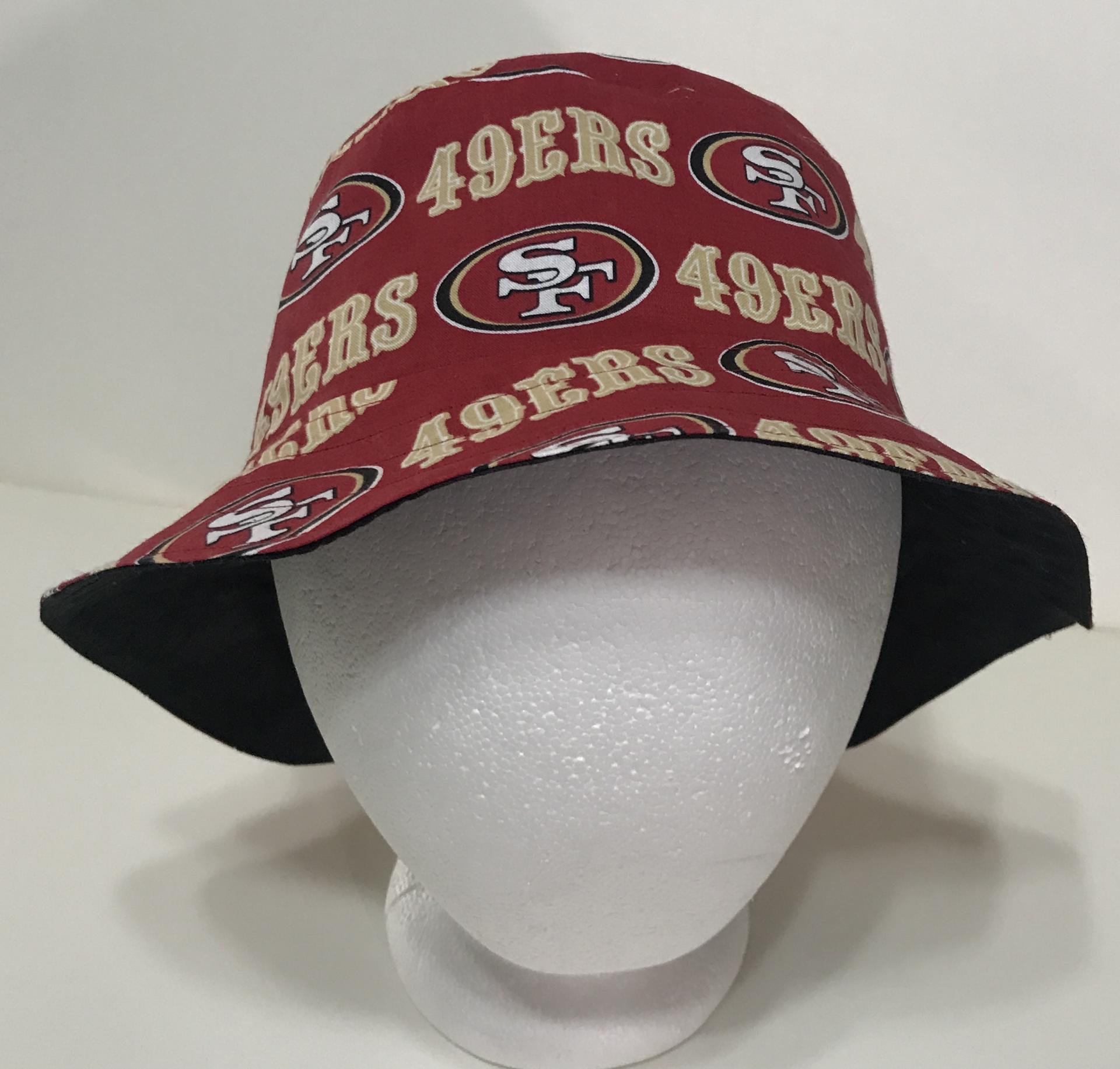 Front view, 49ers bucket hat, red, some black showing under brim