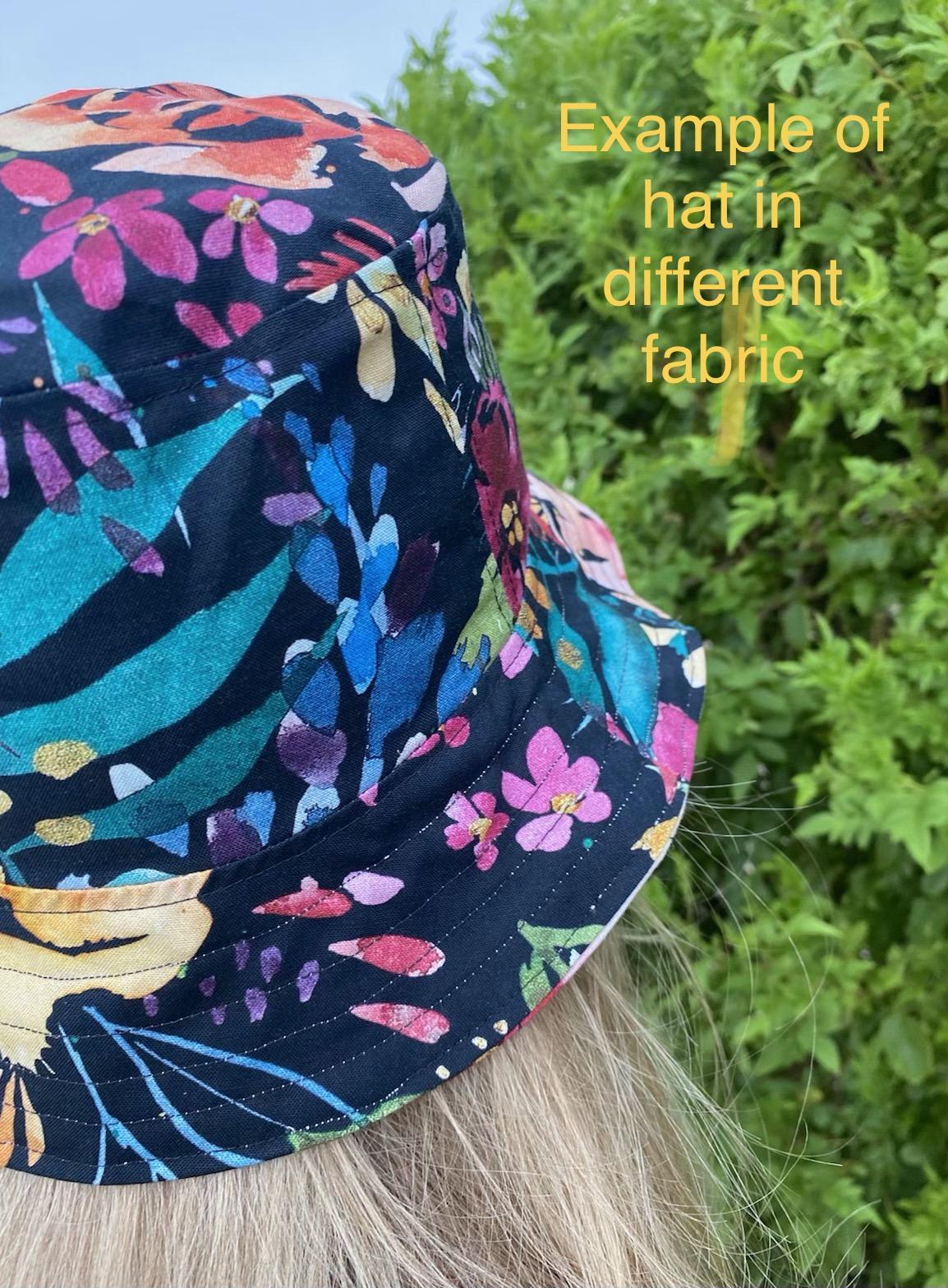 Same hat in different fabric, worn by adult woman