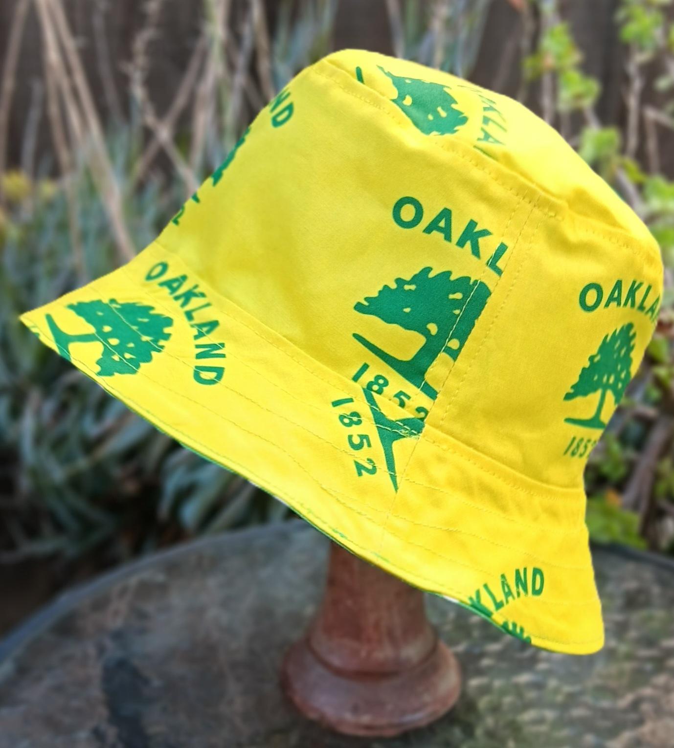 SELL the Team Bucket Hat, Reversible to the old Oakland City tree symbol on yellow, Unisex sizes up to 4XL, Oakland, floppy hat, sun hat, adults and older children