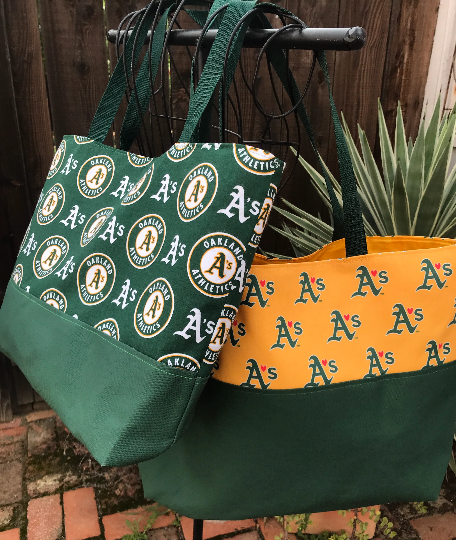 Tote bag, canvas bottom, Oakland A's Athletics circle logo, hook & loop closure, one interior pocket, strong webbing straps