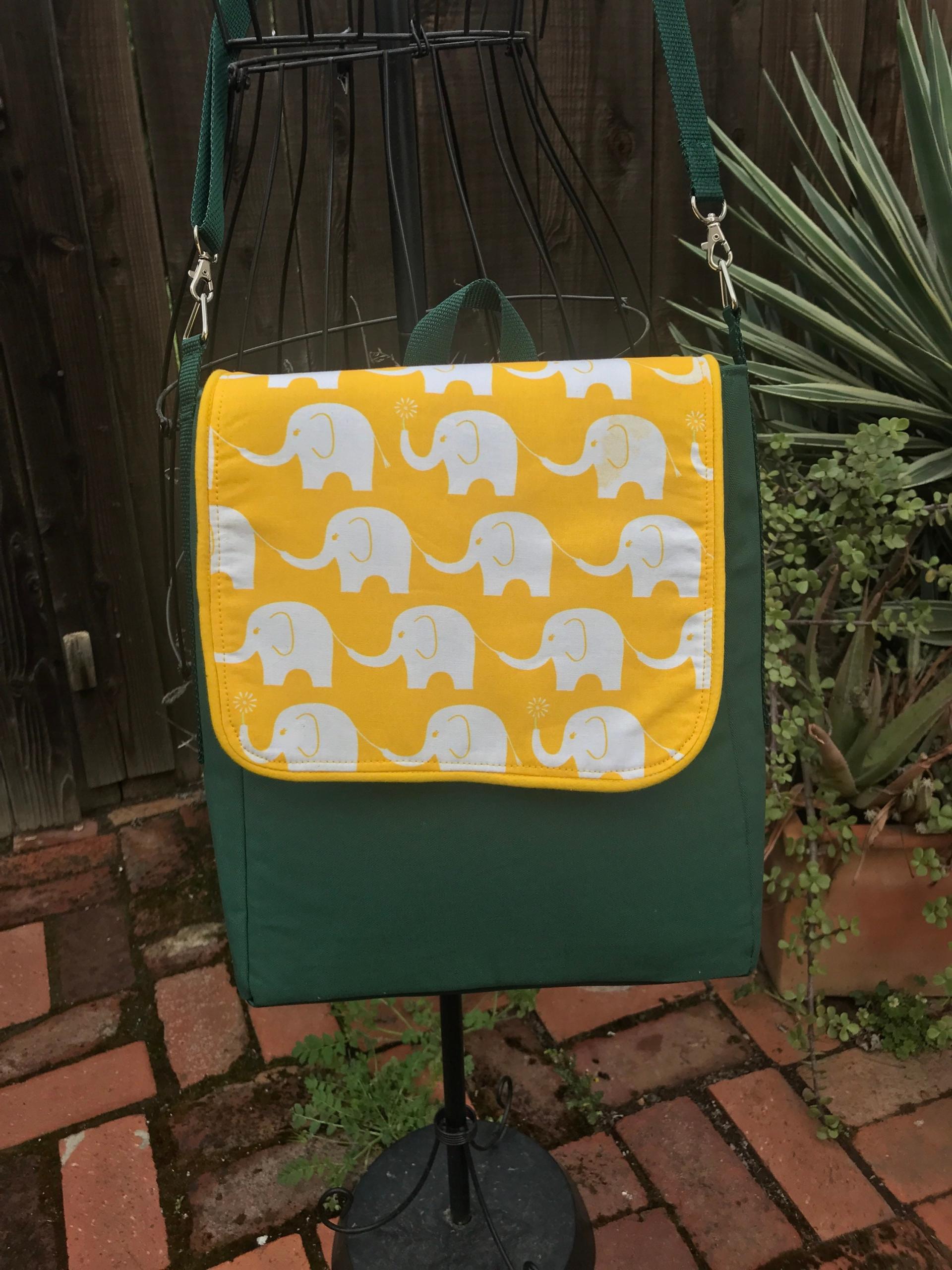 Slim tall messenger style cross body scorebook bag or satchel, canvas, vinyl bottom, white elephants on yellow
