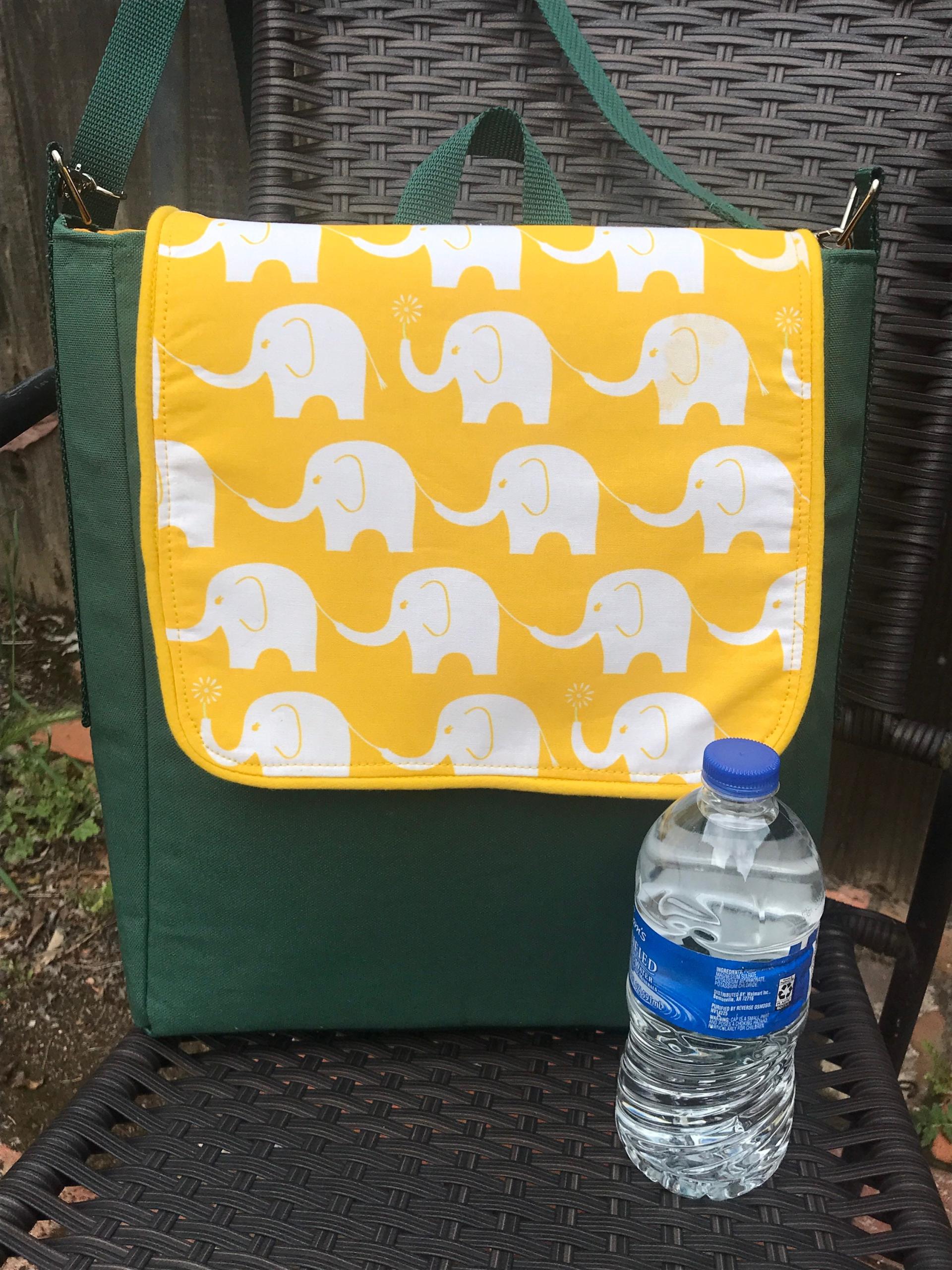 Slim tall messenger style cross body scorebook bag or satchel, canvas, vinyl bottom, white elephants on yellow