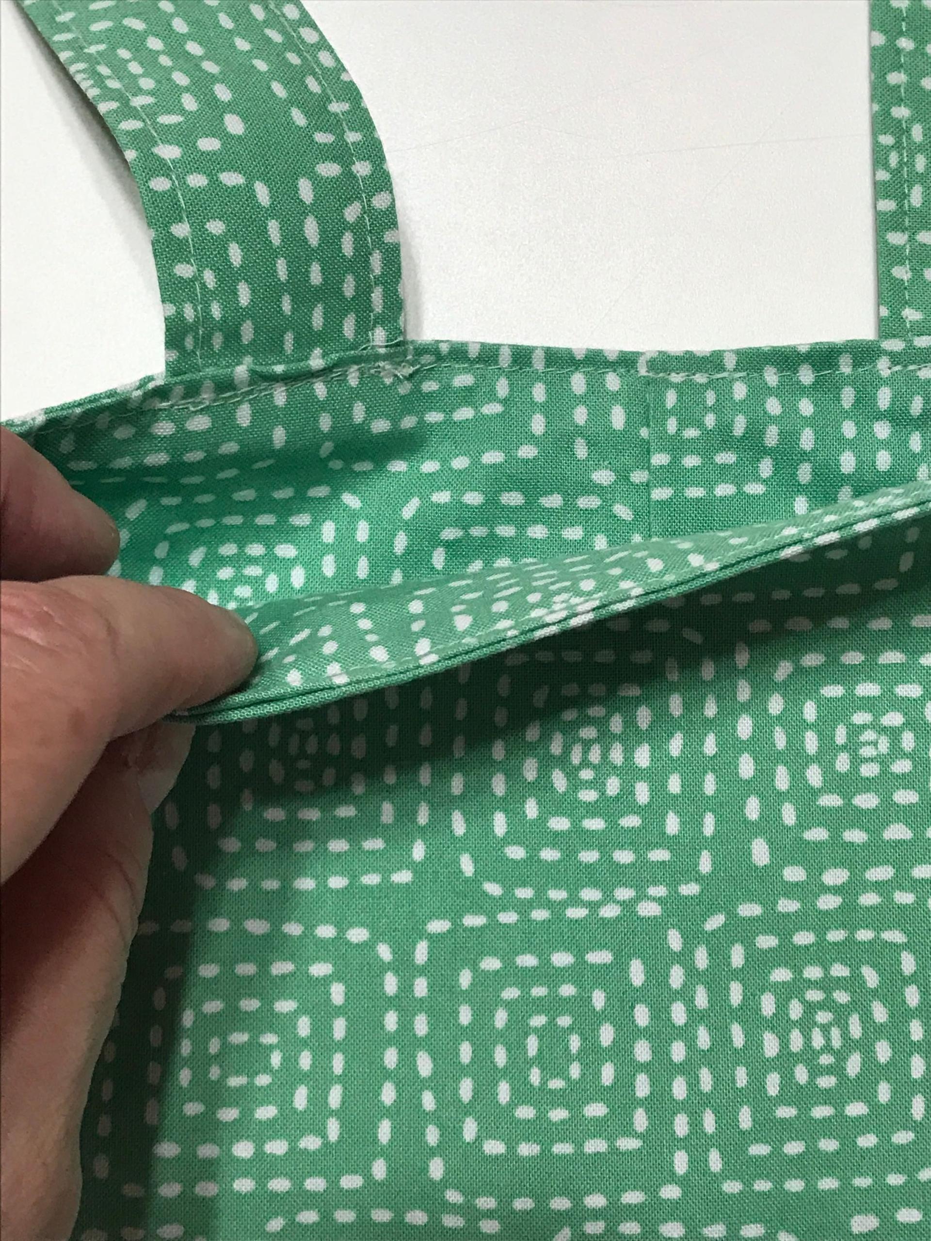 Simple small basic crutch bag, walker bag, scooter handlebars bag, bed rail caddy, white dashed squares on light green