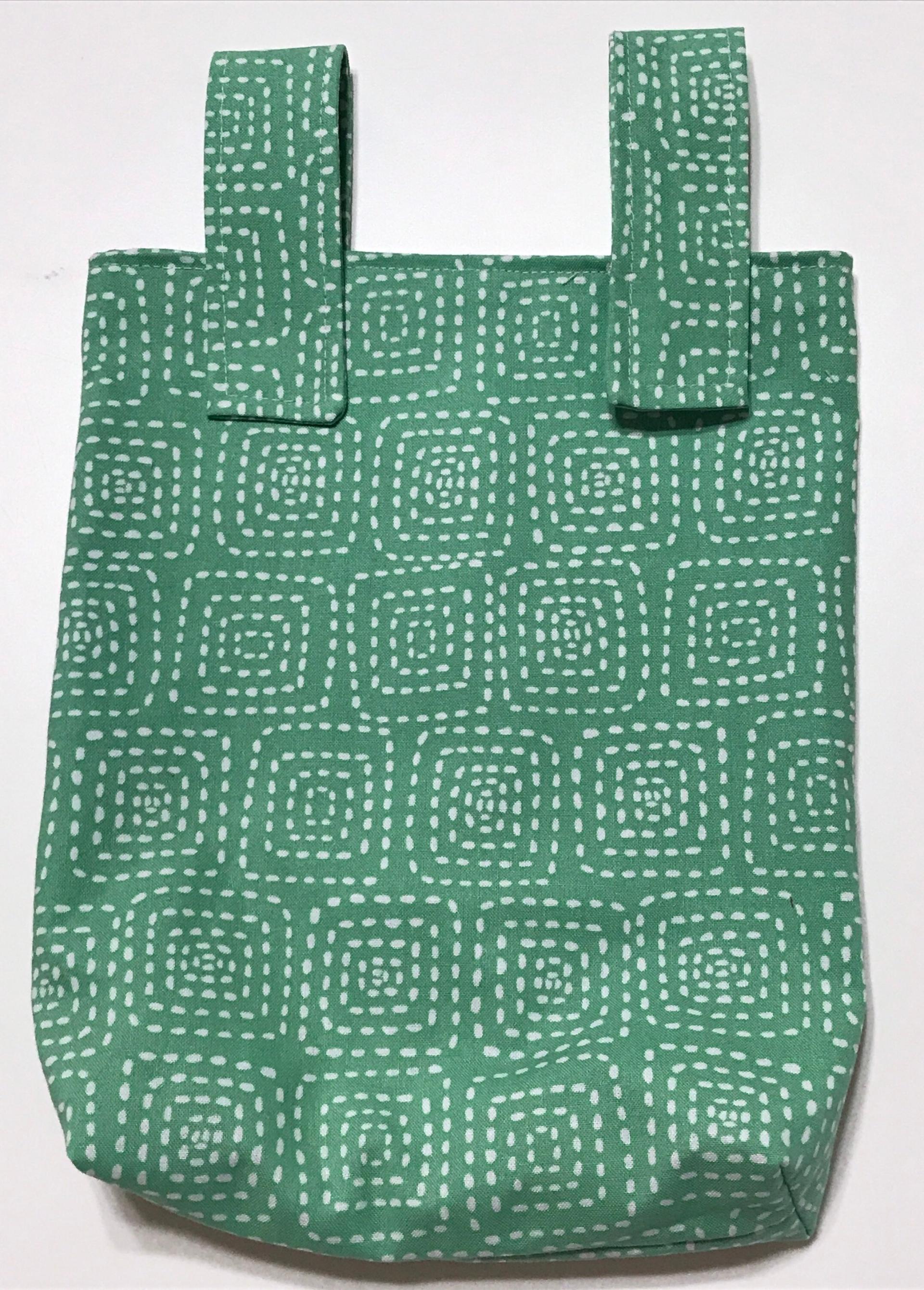 Simple small basic crutch bag, walker bag, scooter handlebars bag, bed rail caddy, white dashed squares on light green