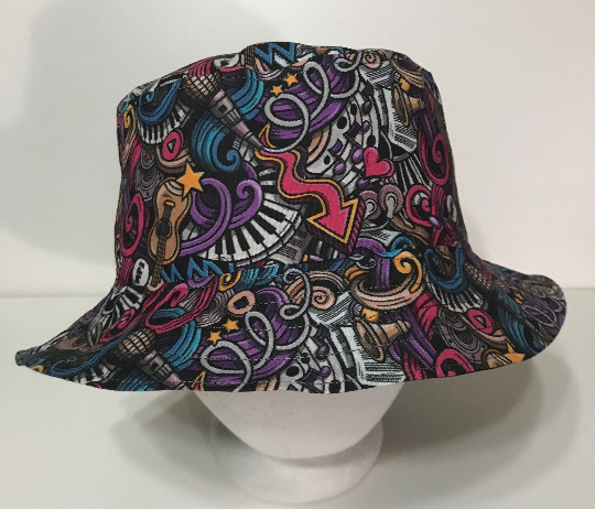 Front view, multicolored music theme bucket hat with doodle style print
