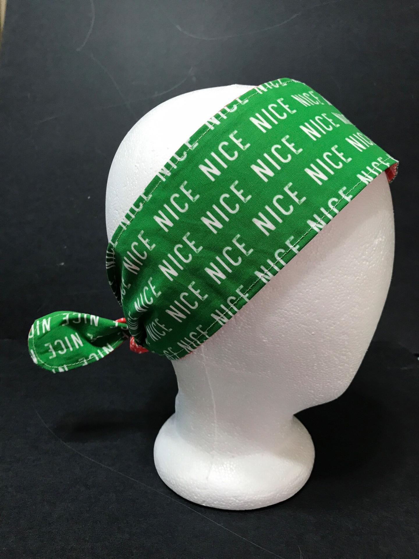 Christmas theme headband showing it tied in back, green Nice sides showing