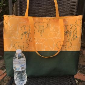 Tote bag, canvas bottom, green & white elephant outlines, hook & loop, one interior pocket, polypropylene straps, Oakland A's Athletics