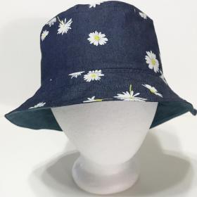 Front view, denim bucket hat with scattered small white daisies print