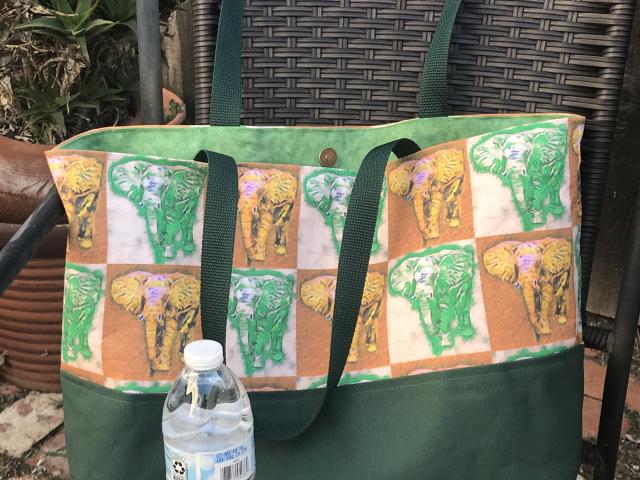 Tote bag, green & yellow elephants, water bottle  to show scale (not included)