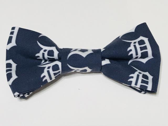 White Old English D on dark blue