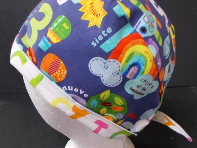 Bilingual Reversible Unisex scrub cap, tie back