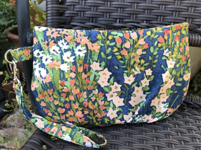 Pleated floral wristlet clutch purse, recessed zipper top, removable swivel wrist strap, cosmetic bag, make up pouch, bridesmaid gift, garden wedding, blue green peach orange flowers