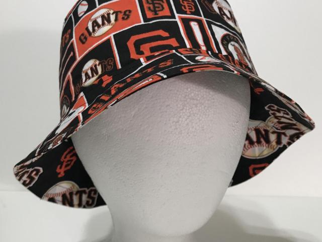 Giants bucket hat, front view showing all over block style Giants print