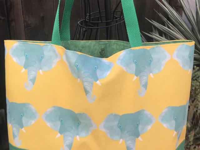 Tote bag, canvas bottom, green watercolor elephants on yellow, magnetic snap, one pocket